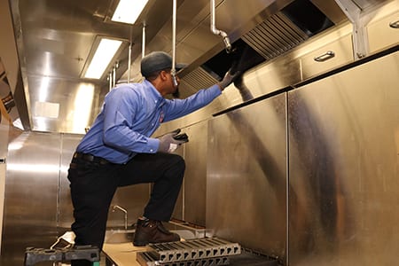 Inspecting a kitchen fire suppression system