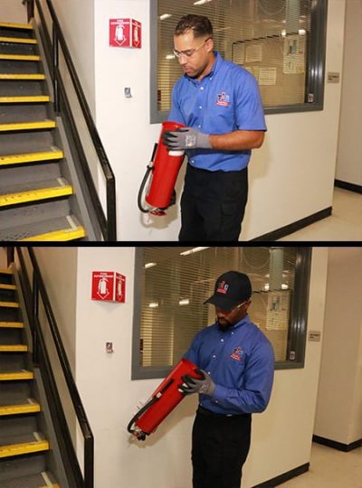 Total Fire Protection technicians performing fire extinguisher maintenance